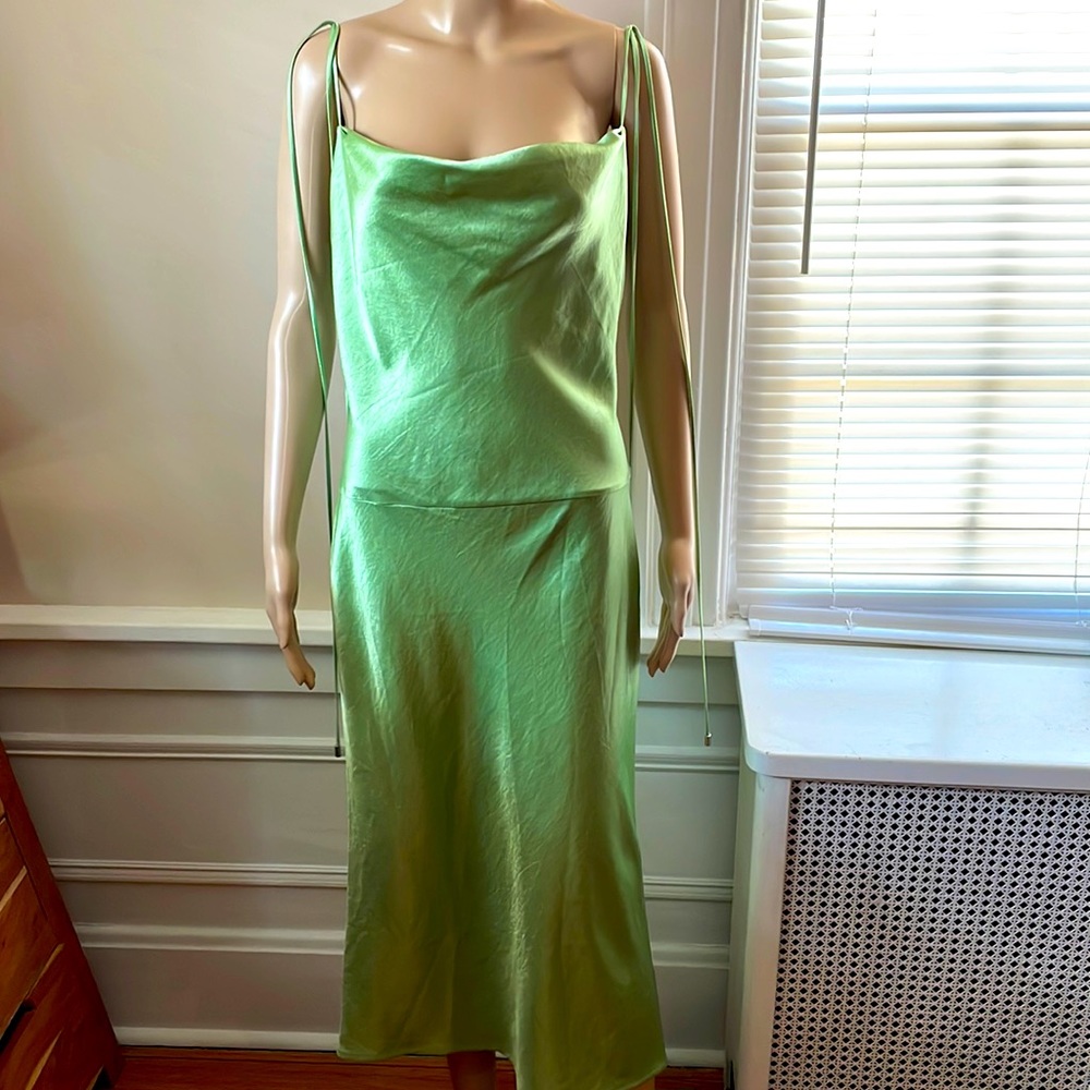 HUGO BOSS Size 4 brand new with tags green dress for a casual or night event.